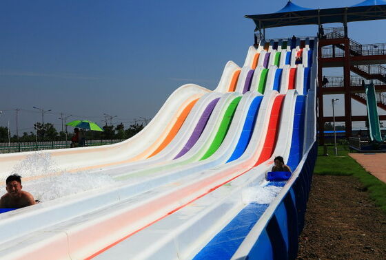 Slide Air Pelangi Multi-Lane untuk Taman Air. Slide Balap Mat 4-Lane. Produsen Slide Pelangi Serat Kaca Sejak 1994