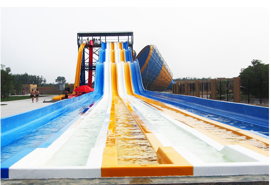 Slide Air Pelangi Multi-Lane untuk Taman Air. Slide Balap Mat 4-Lane. Produsen Slide Pelangi Serat Kaca Sejak 1994