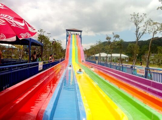 Slide Air Pelangi Multi-Lane untuk Taman Air. Slide Balap Mat 4-Lane. Produsen Slide Pelangi Serat Kaca Sejak 1994